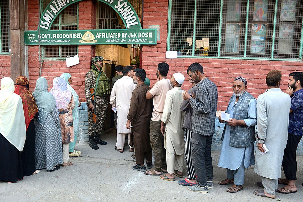 J&K Assembly elections, 2nd Phase voting: People wait in queues to cast their votes in Srinagar - | Photo: PTI