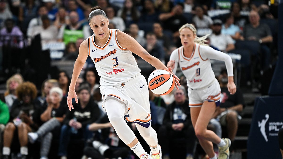 Diana Taurasi #3 of the Phoenix Mercury dribbles the ball up the court after a turnover by the Minnesota Lynx in the first quarter in Game Two of Round One of the WNBA Playoffs at Target Center on September 25, 2024, in Minneapolis, Minnesota. - null