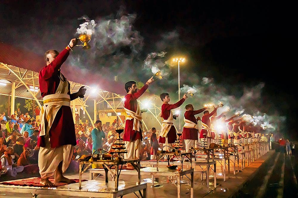 Ganga aarti  being performed to the chants of Vedic hymns