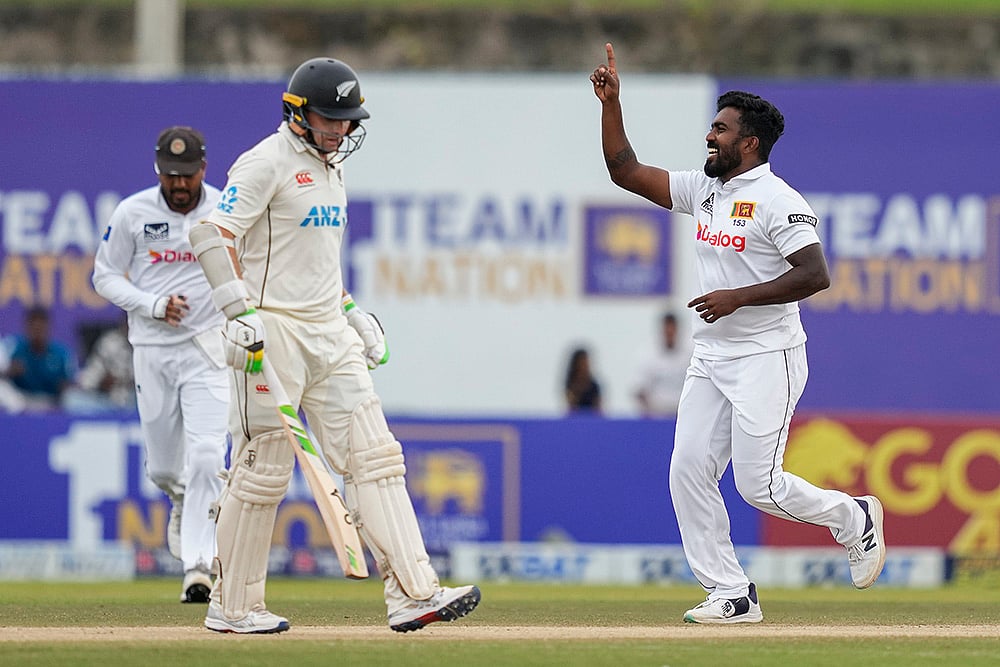 | Photo: AP/Eranga Jayawardena : Sri Lanka vs New Zealand 2nd Test: Sri Lanka's Asitha Fernando celebrates the wicket of New Zealand's Tom Latham 