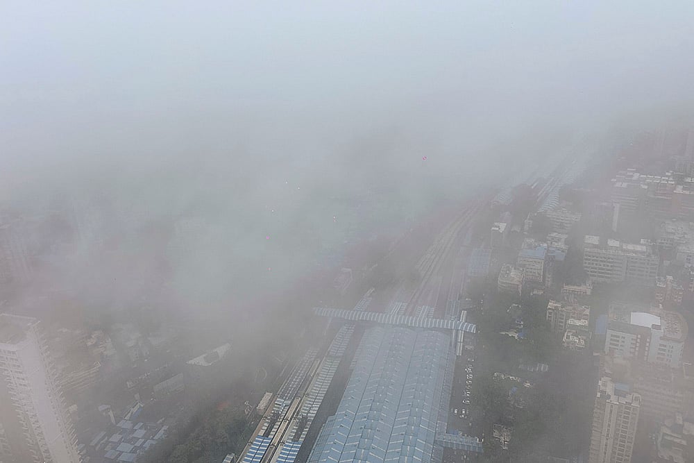 dense clouds shrouding the city of Mumbai