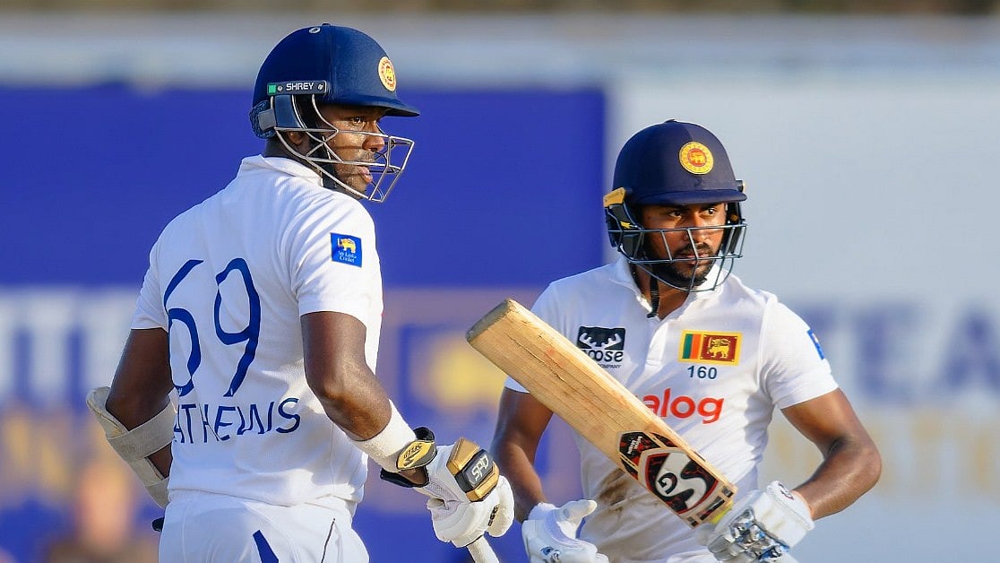 Photo: X | Sri Lanka Cricket : Sri Lanka batters Kamindu Mendis (R) and Angelo Mathews on Day 1 of the Galle Test.