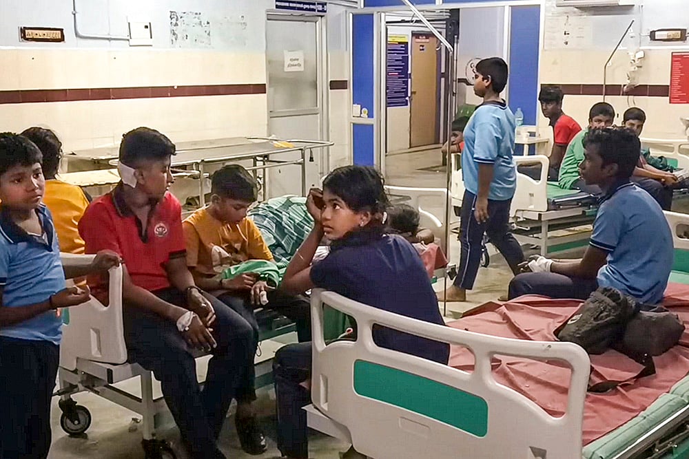 | Photo: PTI : Students injured after bus overturned in TN's Theni