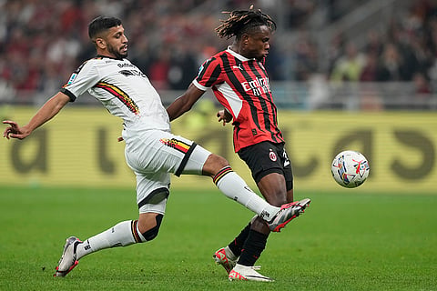 Serie A 2024-25, AC Milan vs Lecce: Lecce's Hamza Rafia clears the ball in front of AC Milan's Samuel Chukwueze 