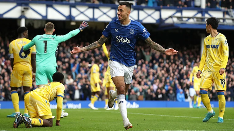Dwight McNeil celebrates bagging a brace for Everton against Crystal Palace - null