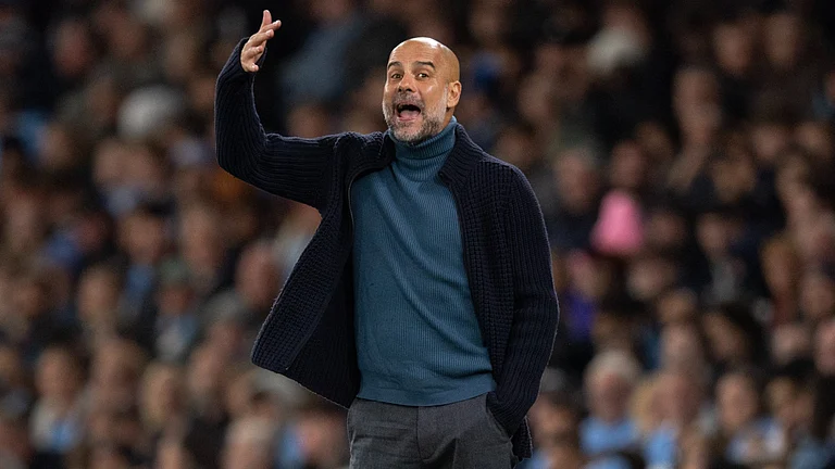 Pep Guardiola called his rivalry with Arsenal "war" after 2-2 draw - null