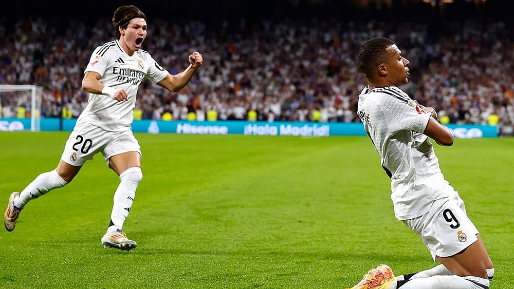 | Photo: AP/Pablo Garcia : La Liga 2024-25 Real Madrid vs Real Betis: Real Madrid's Kylian Mbappe celebrates after scoring his sides first goal 