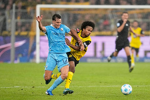 German Bundesliga 2024-25, Borussia Dortmund vs VfL Bochum: Dortmund's Karim Adeyemi fights for the ball with Bochum's Tim Oermann