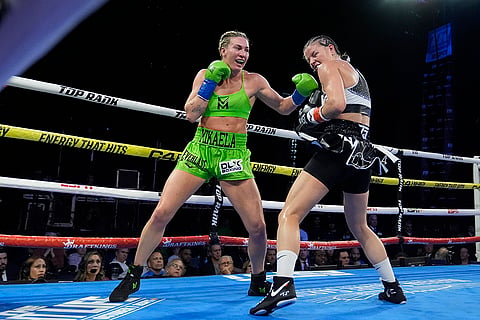 Sandy Ryan vs Mikaela Mayer Boxing: Mikaela Mayer, left, punches England's Sandy Ryan