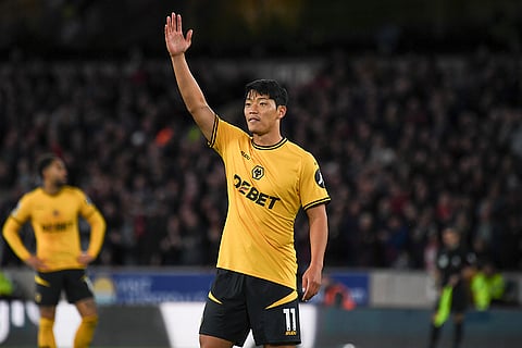 English Premier League 2024-25, Wanderers vs Liverpool: Wolverhampton Wanderers' Hwang Hee-chan reacts during the match