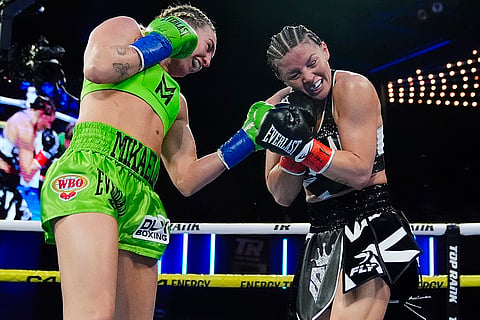Sandy Ryan vs Mikaela Mayer Boxing: Mikaela Mayer, left, punches Sandy Ryan