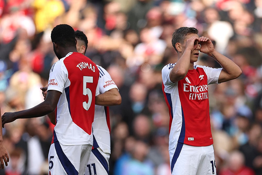 Britain Soccer Premeir League Arsenal and Leicester City Photo gallery_7