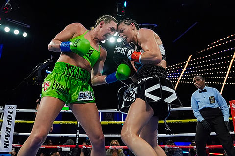 Sandy Ryan vs Mikaela Mayer Boxing: Mikaela Mayer, left, and England's Sandy Ryan during a women's WBO welterweight title boxing
