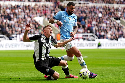 EPL 2024-25, Newcastle vs Manchester City: Newcastle United's Harvey Barnes, left, and Manchester City's Kyle Walker vie for the ball 