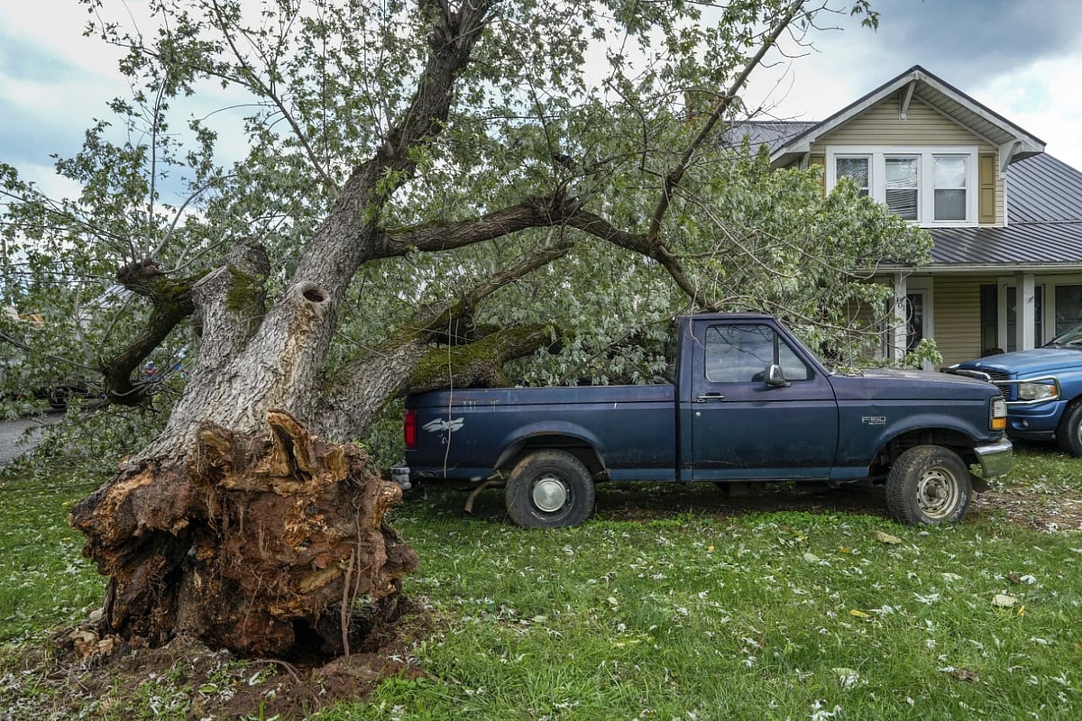 AP : Rescue teams are working to reach stranded residents, but blocked roads and power outages continue to hamper relief efforts. 