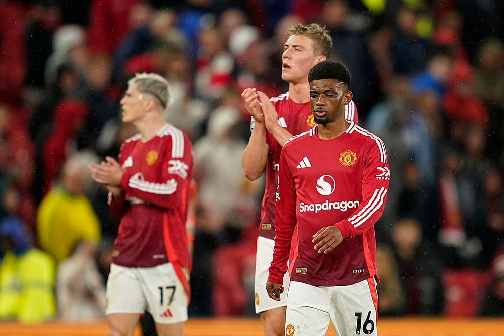 | Photo: AP/Dave Thompson : EPL 2024-25 Man United Vs Tottenham: Manchester United players react disappointed after the match