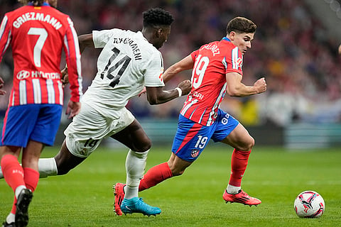 La Liga 2024-25 Atletico Madrid vs Real Madrid: Atletico Madrid's Julian Alvarez in action in front of Real Madrid's Aurelien Tchouameni 