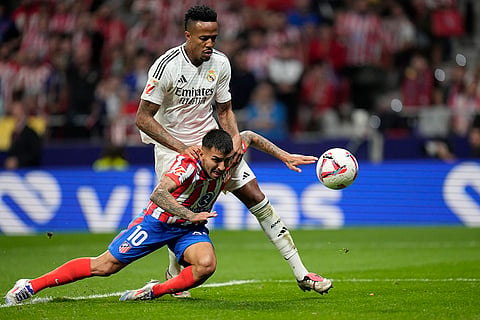 La Liga 2024-25 Atletico Madrid vs Real Madrid: Atletico Madrid's Angel Correa scores in front of Real Madrid's Eder Militao 