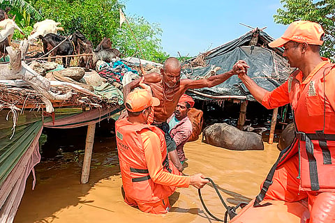 Bihar Floods: NDRF personnel conduct a rescue operation 