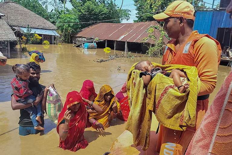 Bihar Floods: NDRF personnel conduct a rescue operation in Supaul district - | Photo: PTI