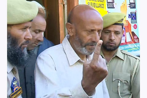 3rd phase of J&K polls: Awami Ittehad Party chief Sheikh Abdul Rashid shows his finger marked with indelible ink 