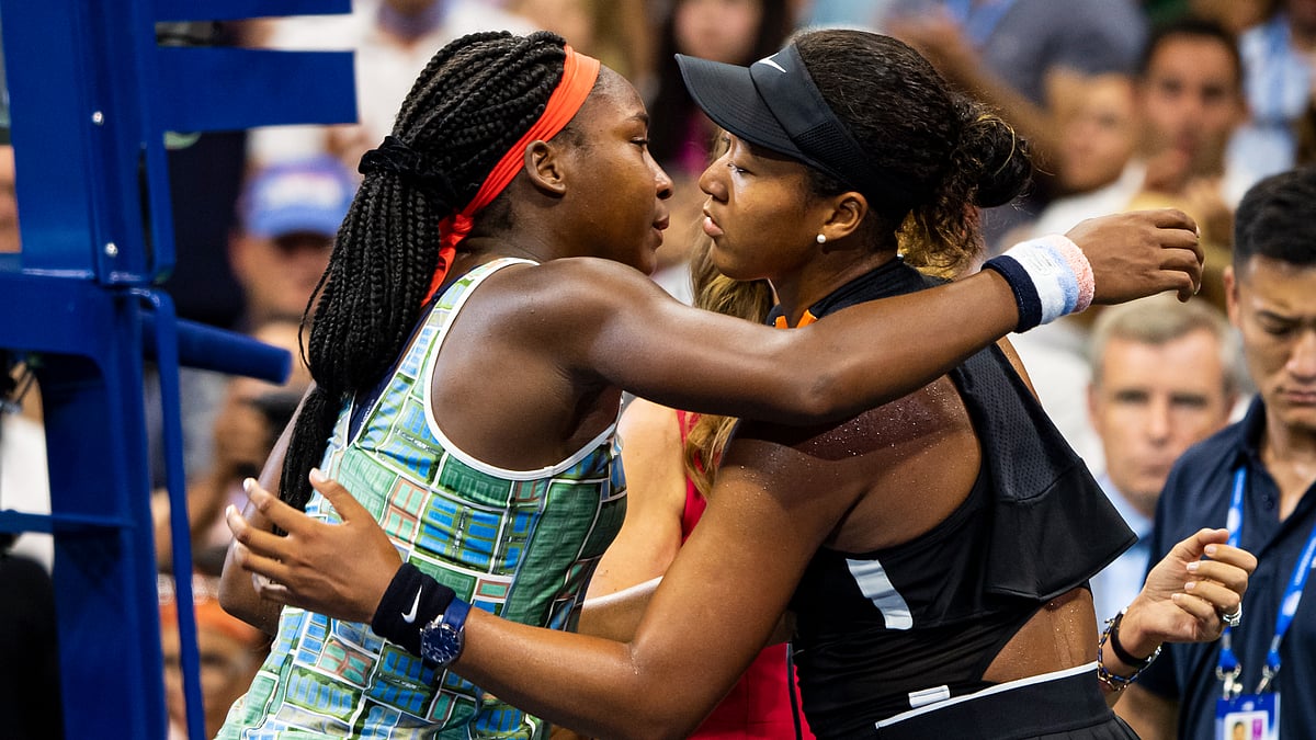 Naomi Osaka embraces Coco Gauff after retiring through injury