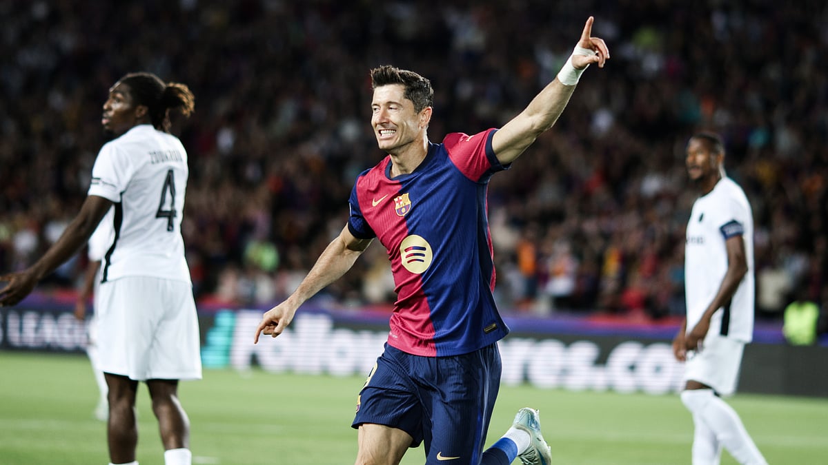 Robert Lewandowski celebrates after scoring against Young Boys