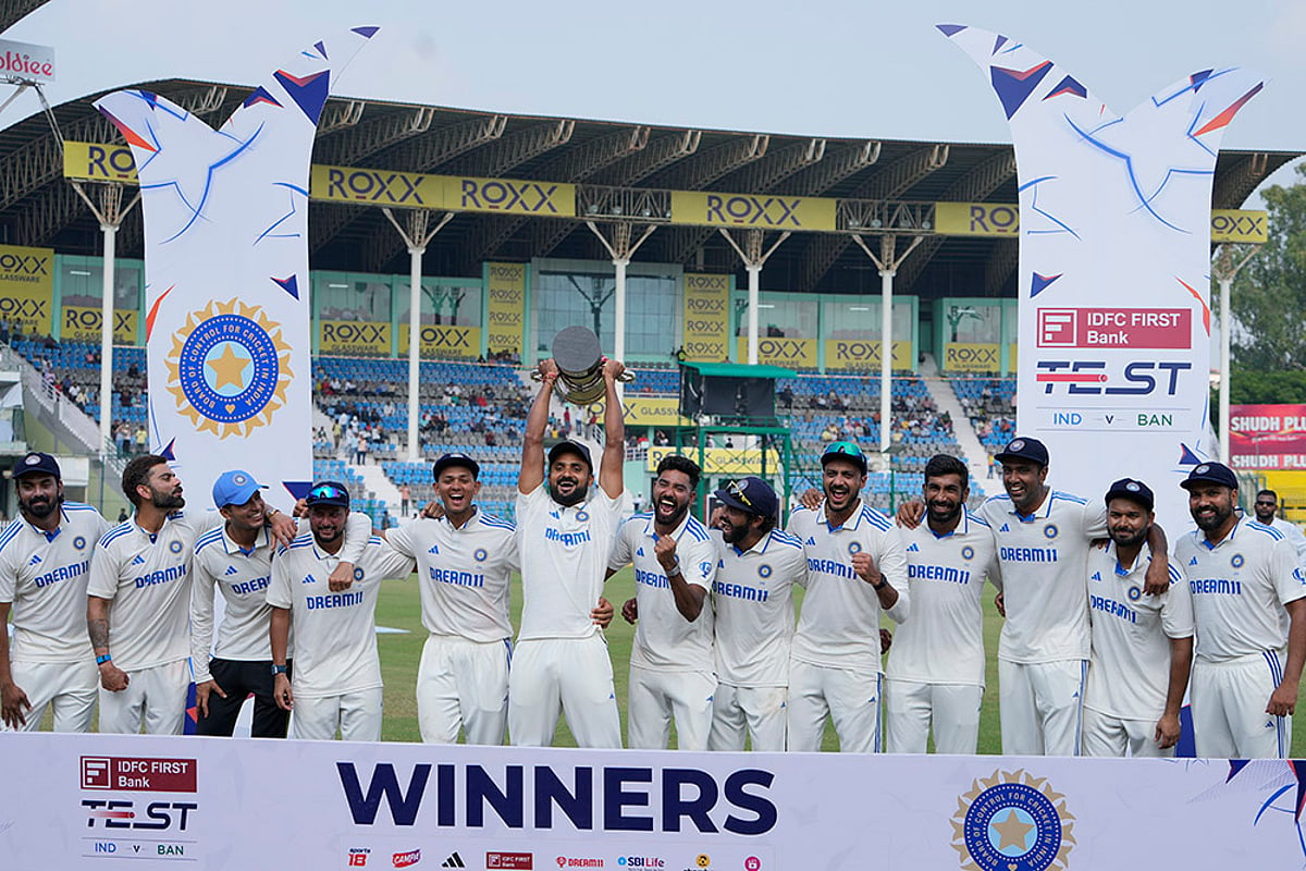 India vs Bangladesh 2nd test day 5 Indian players celebrate with the trophy