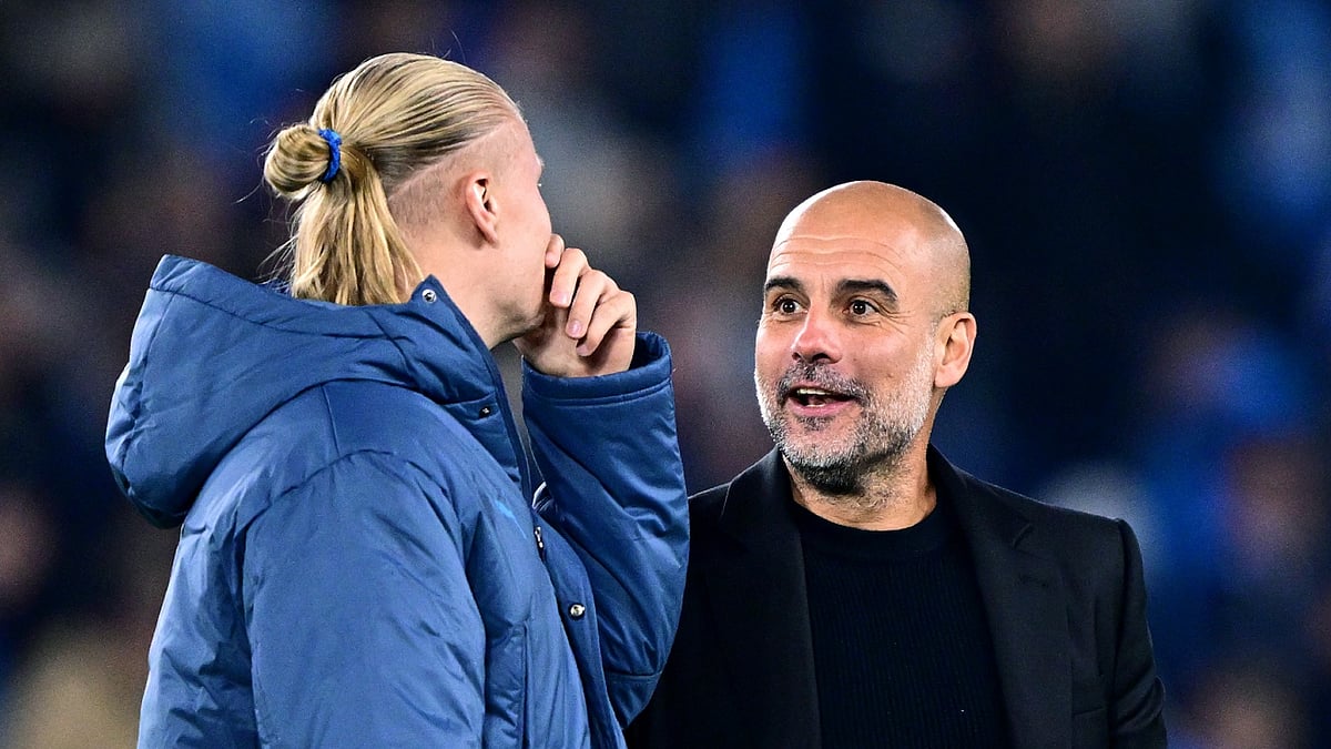 Erling Haaland and Pep Guardiola - null