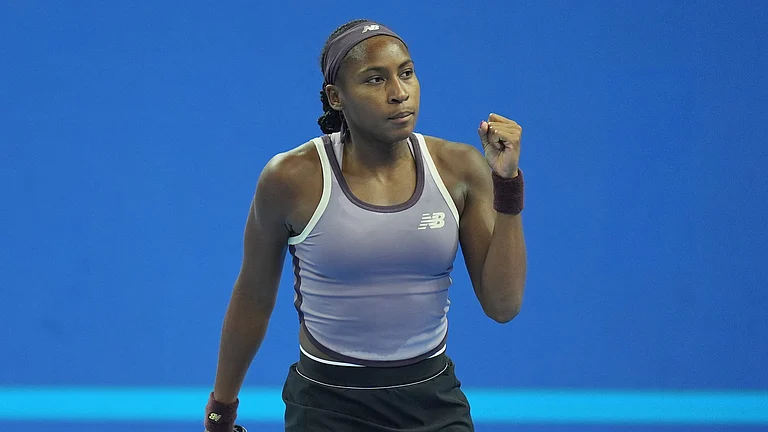 Coco Gauff came from behind to win in Beijing. - null