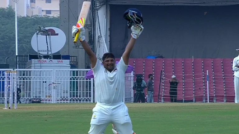 Sarfaraz Khan celebrates after completing his double hundred. - X/mufaddal_vohra