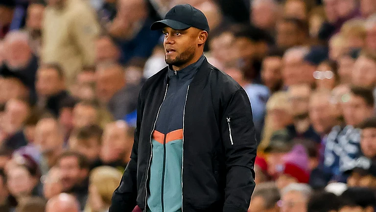 Vincent Kompany looks on at Villa Park. - null