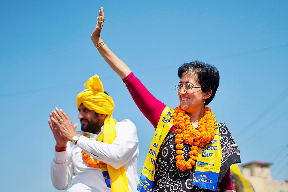 Delhi Chief Minister Atishi greets supporters in Hisar district