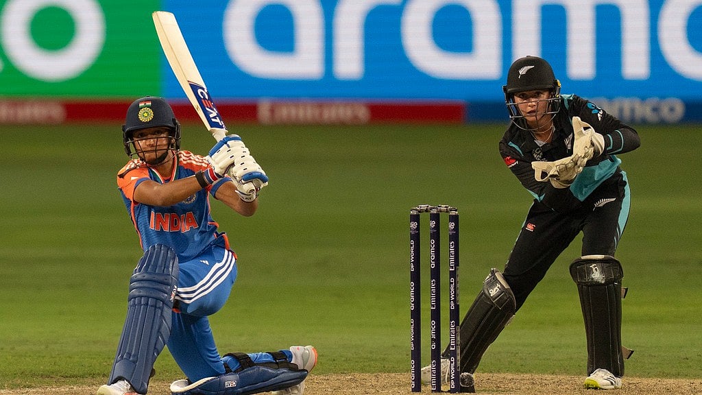 Harmanpreet Kaur (left) bats during the India vs New Zealand clash at ICC Women's T20 World Cup 2024 in Dubai. - Photo: AP