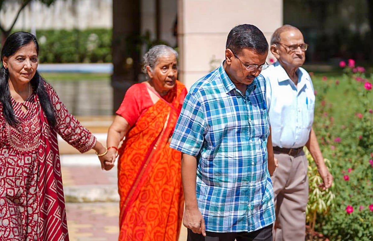 PTI : AAP National Convenor Arvind Kejriwal with his wife and parents leaves CM residence days after resigning from the chief minister's post, in New Delhi. 