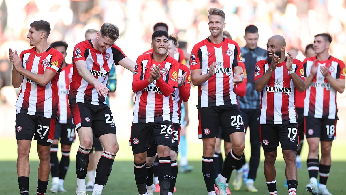 Brentford's players celebrate their thrilling win over Wolves. - null