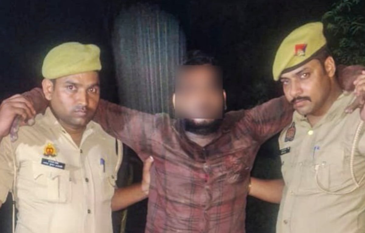 PTI : Police take away Chandan Verma after he sustained injuries on his right leg following an encounter with the police early Saturday morning, Oct. 5, 2024.