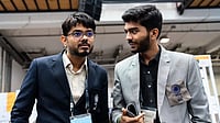 FIDE/Maria Emelianova : File photo of Indian open team captain Srinath Narayanan (left) talking to D Gukesh after a game at the Chess Olympiad in Budapest (2024).