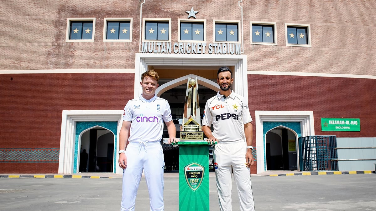Photo: X | Pakistan Cricket : England captain Ollie Pope (L) with Pakistan Test captain Shan Masood with the trophy.
