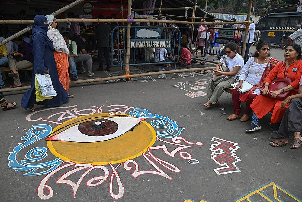 Photo: PTI : Protest against Kolkata rape-murder