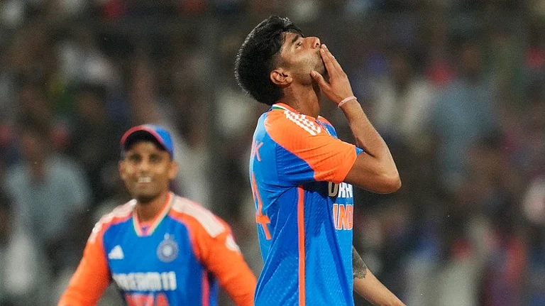 India's Mayank Yadav, right, reacts as he celebrates the wicket of Bangladesh's Mahmudullah during the first T20I. - AP/Manish Swarup