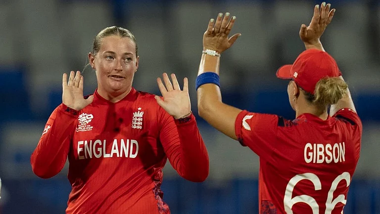 Sophie Ecclestone (left) celebrates a wicket against South Africa in Sharjah. - AP