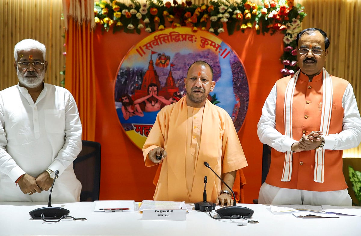 PTI : Uttar Pradesh Chief Minister Yogi Adityanath with Deputy CM Keshav Prasad Maurya unveils the logo of 'Mahakumbh Prayagraj 2025' during a meeting, in Prayagraj.