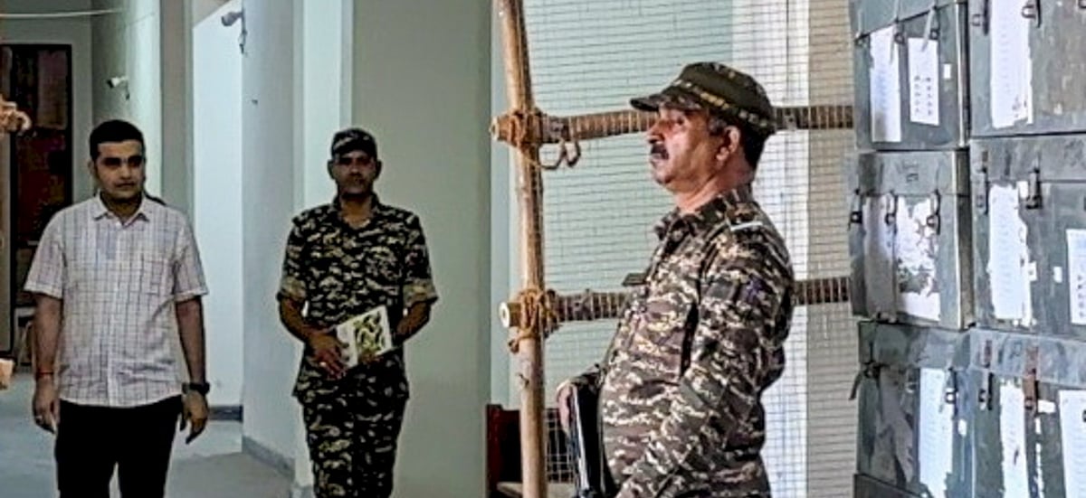 PTI : District Election Officer and Deputy Commissioner Vikram Singh (L) inspects strong rooms ahead of the counting of votes of the Haryana Assembly elections, in Faridabad district, Sunday, Oct. 6, 2024