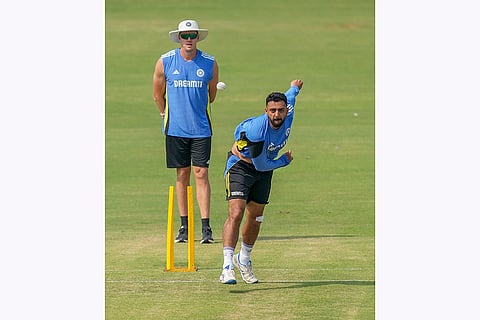 India vs Bangladesh: India’s Varun Chakravarthy bowls a delivery during a practice session 