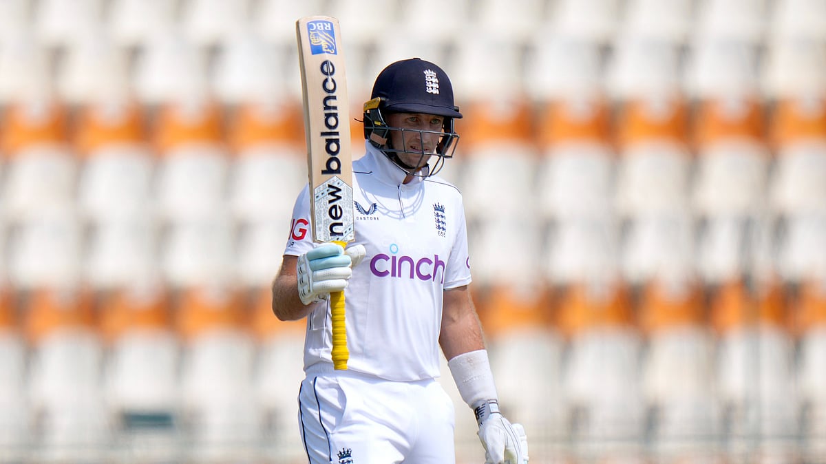 England's Joe Root celebrates after scoring a fifty during the third day of the first test cricket match between Pakistan and England, in Multan. - AP Photo/Anjum Naveed