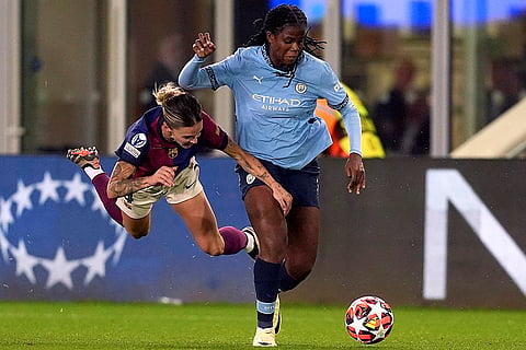 Women's Champions League: Manchester City's Khadija Shaw, right, and Barcelona's Maria Leon, left, challenge for the ball 