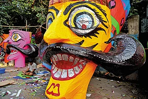 Photo: Suresh K. Pandey : Artisans at Work: An imposing visage of Raavan being created in Delhi’s Tatarpur area