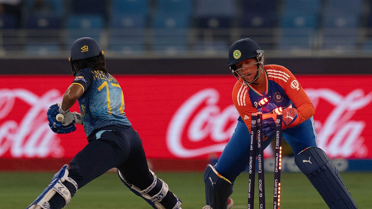 AP Photo/Altaf Qadri : India's Richa Ghosh stumps out Sri Lanka's Anushka Sanjeewani during the ICC Women's T20 World Cup 2024 match between India and Sri Lanka in Dubai.