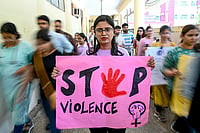 The Invisible Burden: Plight of Women's Work And The Need For Reform NARINDER NANU/AFP via Getty Images : A medical professional holds a placard during a demonstration to condemn the rape and murder of a medic from Kolkata, at a hospital in Amritsar on August 22, 2024. Saving lives was the childhood dream for 28-year-old Indian doctor Radhika, but after the brutal rape and murder of a colleague her own safety has increasingly become a top concern.